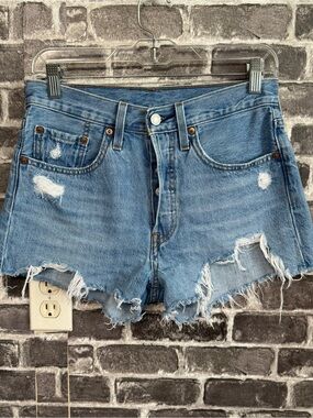 Levi’s 501 jean denim shorts Distressed medium wash
